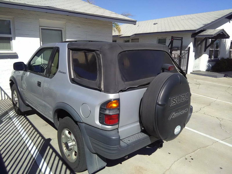 Illustration for article titled For $1,300, Could This 1999 Isuzu Amigo Become Your New Best Friend?